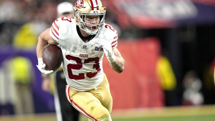 49ers reward Christian McCaffrey with a 2-year contract extension, AP source says