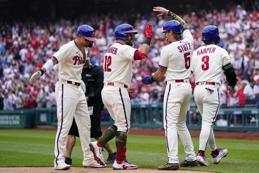 Aaron Nola, Kyle Schwarber power Phillies past Cubs 12-3 to snap 5-game skid