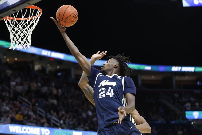 Akron rocks rival Kent State 75-55 for MAC title, NCAA berth