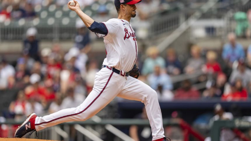 Albies drives in winning run in 10th as Braves beat Cardinals 3-2 in opener of split doubleheader