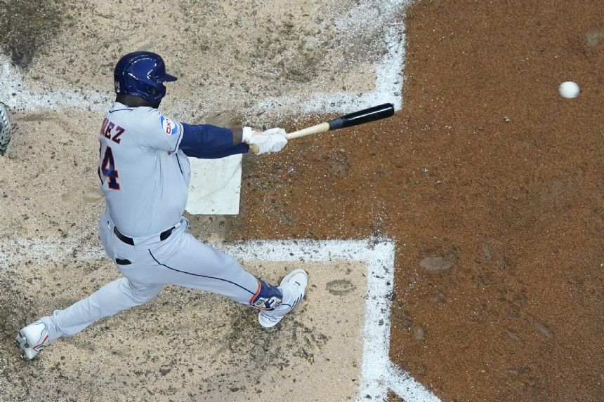 Alvarez hits solo homer, slam as the Astros rout Brewers 12-2 for 8th straight win