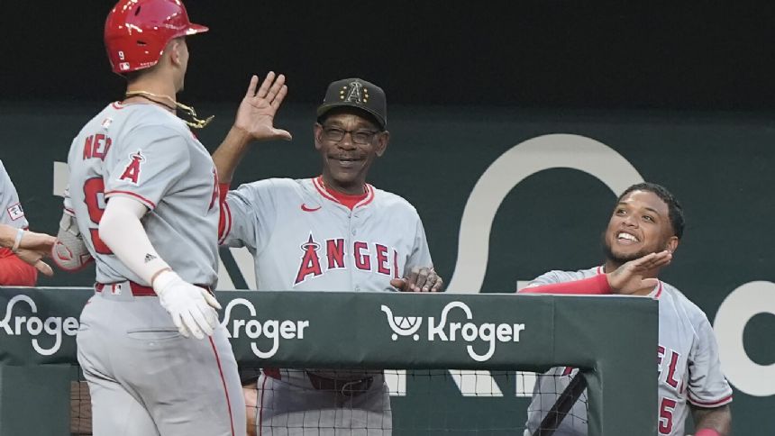 Angels beat Rangers 9-3 to give Ron Washington win in his 1st game as visiting manager in Texas