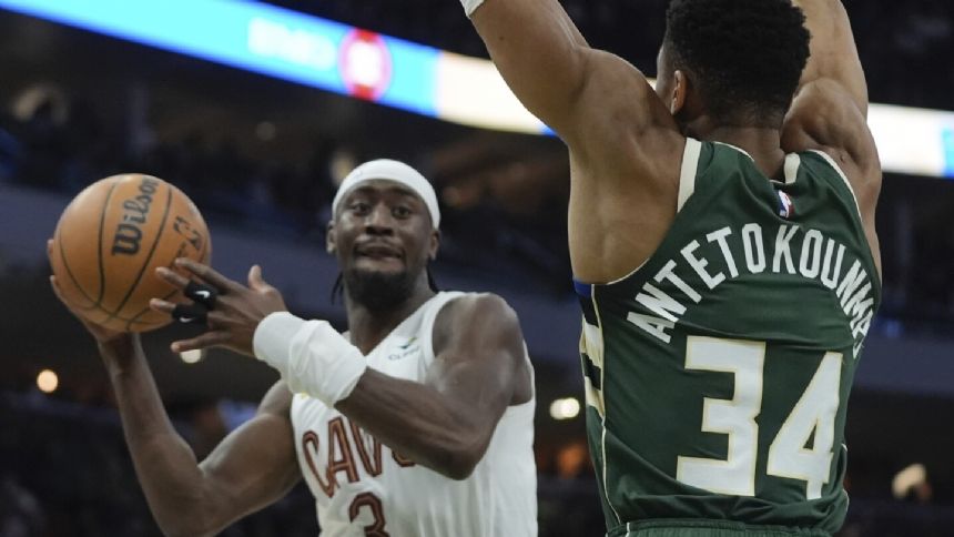 Antetokounmpo records triple-double, Bucks beat Cavs in Central showdown after Griffin firing