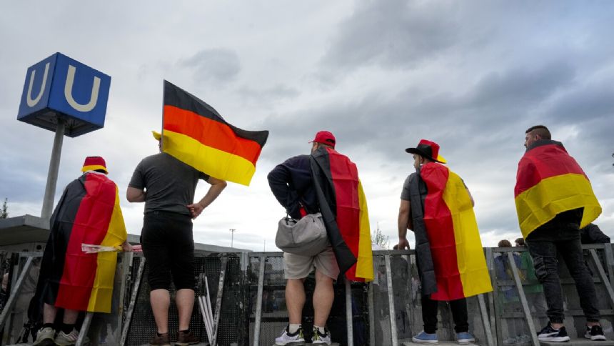 AP PHOTOS: Excitement levels rise among fans at European Championship