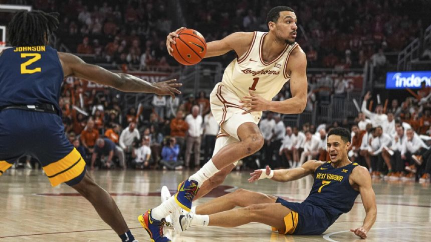 AP player of the week: Texas forward Dylan Disu averaged 27.5 points in two games