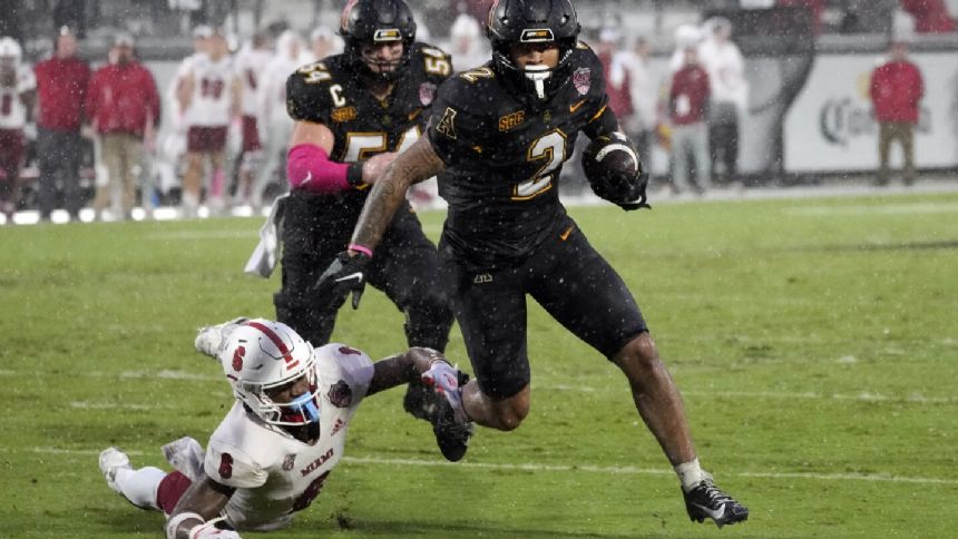 Appalachian State slogs past Miami (Ohio) 13-9 in the rain-soaked Cure Bowl