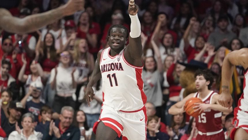 Ballo's double-double, stout second-half defense lift No. 11 Arizona to 82-71 win over Stanford.