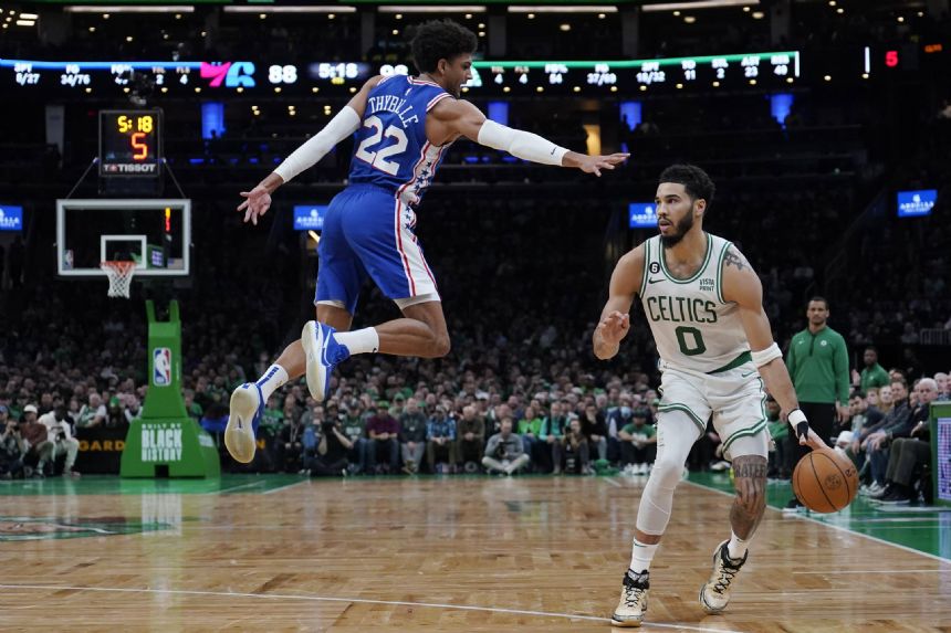 Banged-up Celtics hold off 76ers despite losing Brown