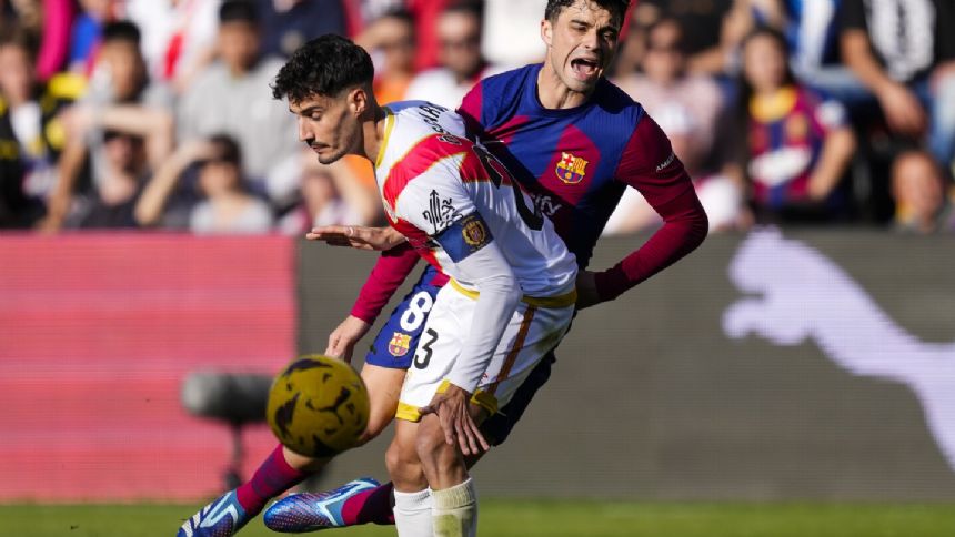 Barcelona needs own goal to salvage 1-1 draw at Rayo in Spanish league