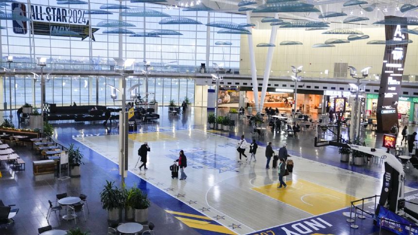 Basketball 'court' at Indianapolis airport to promote NBA All-Star Game is turning heads