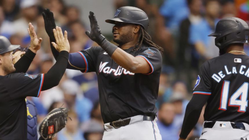 Bell's 3-run homer in 7th inning lifts Marlins past Brewers 7-3