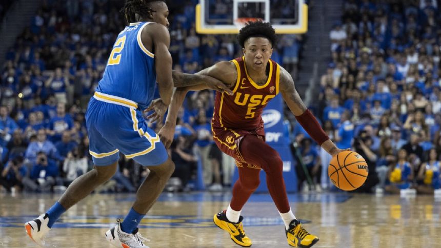 Boogie Ellis scores 24 points to lead USC over UCLA 62-56 and split the LA rivalry