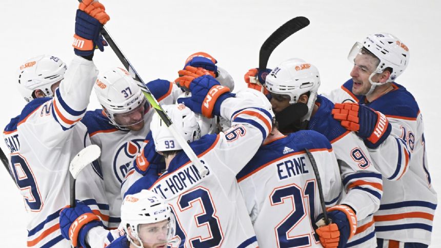 Bouchard helps the Oilers beat the Canadiens 2-1 for a franchise-record 10th straight win