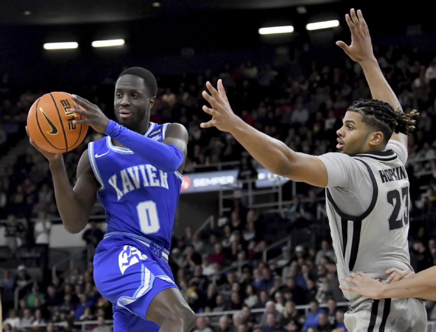 Boum goes the dynamite: Xavier guard scores 33 to beat PC