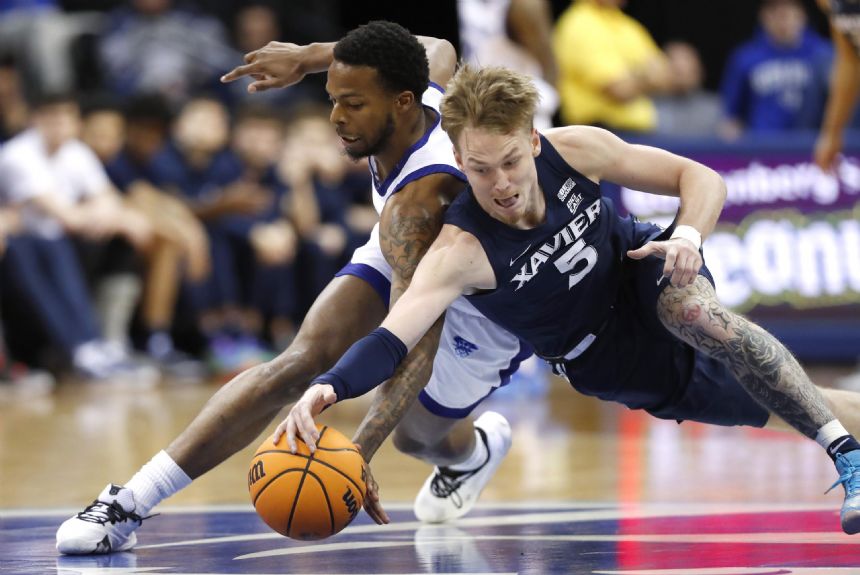 Boum, Jones lead No. 16 Xavier to 82-60 win at Seton Hall