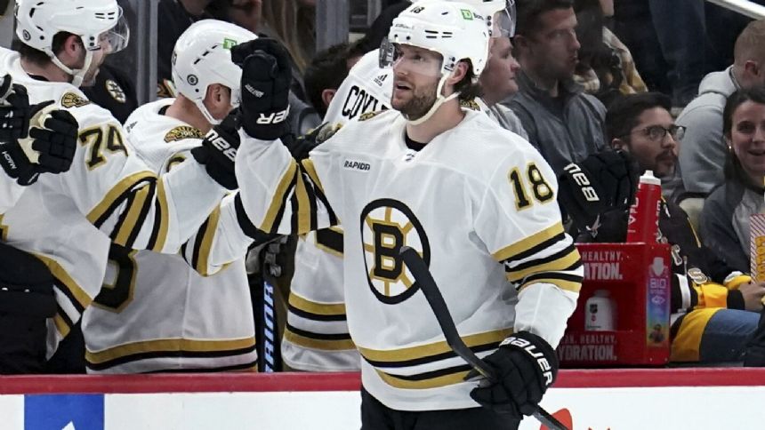 Brad Marchand caps Bruins' four-goal second period in 6-4 win over Penguins