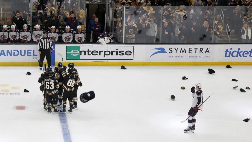 Brad Marchand gets natural hat trick in 3rd period; Bruins beat Blue Jackets, 3-1