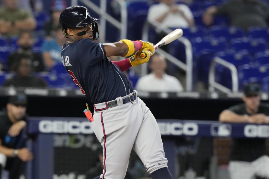 Braves star Acuna Jr. exits after fouling ball off left leg