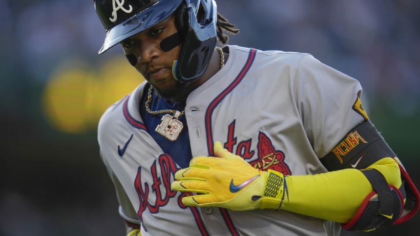 Braves' Ronald Acuna Jr. leaves game vs. Pirates with left knee soreness after leg appears to buckle