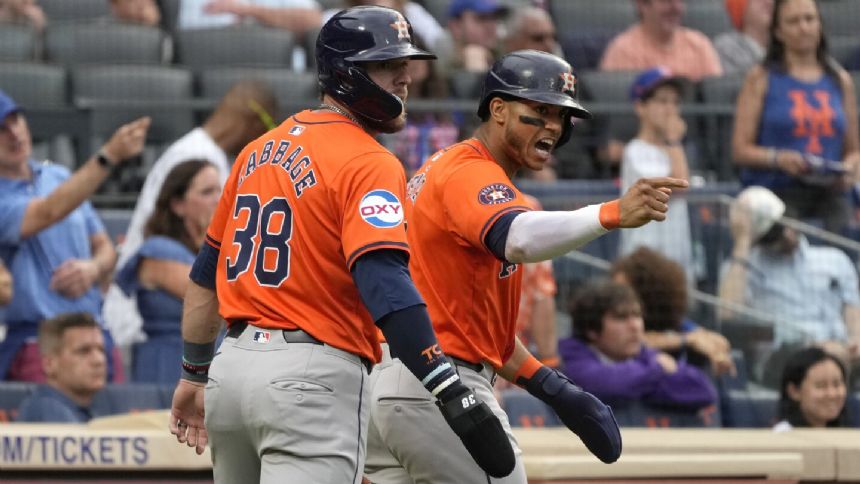 Bregman delivers big hit in 8th as surging Astros rally from 5 down to beat Mets 9-6