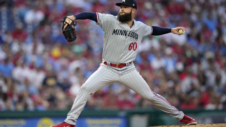 Brewers acquire left-hander Dallas Keuchel from Mariners for cash