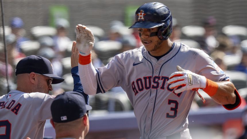Brown pitches 6 innings, Pena and Alvarez homer as Astros beat Blue Jays 3-1 for 10th win in 11