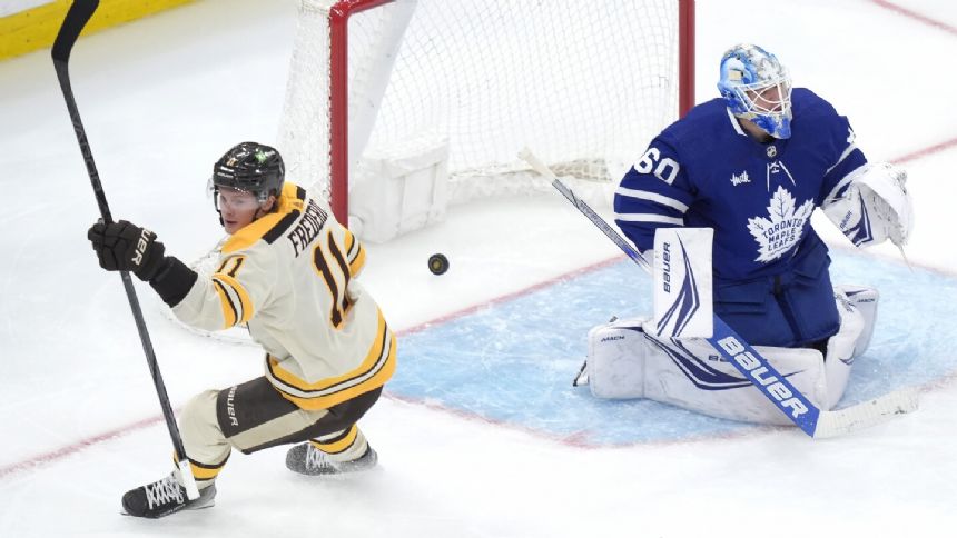 Bruins beat the weary Maple Leafs 4-1 to move within a point of the NHL-leading Panthers