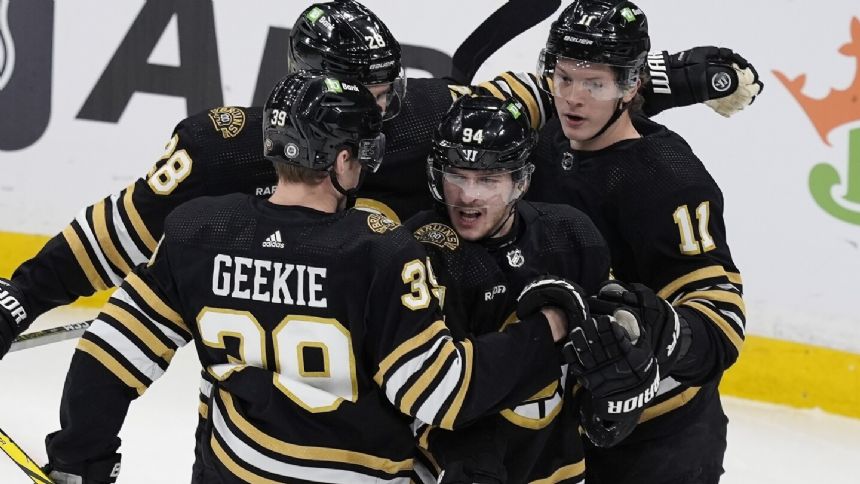 Bruins down Jets 4-1 for 5th straight victory in matchup of NHL division leaders
