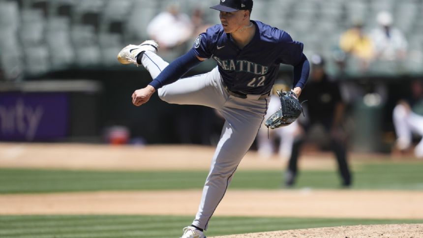 Bryan Woo and 3 relievers combine for 2-hit shutout as Mariners stop A's 2-0