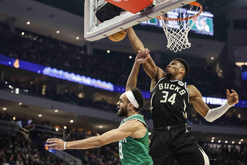 Bucks edge Celtics 131-125 in OT for 11th straight win