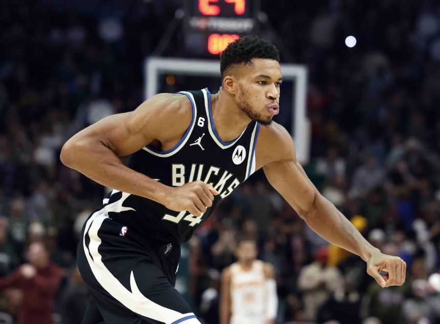 Bucks outlast Hawks 123-115 to maintain perfect record