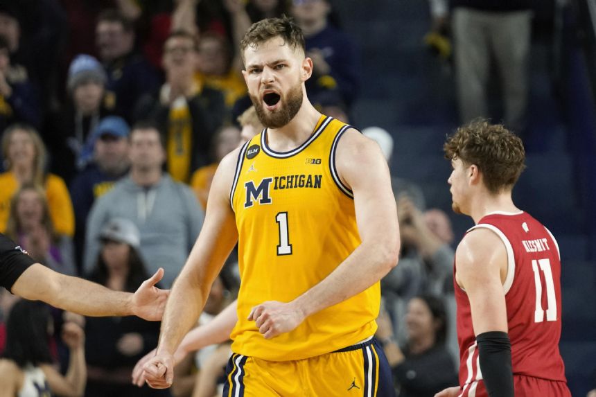 Bufkin, Dickinson lead Michigan past Wisconsin 87-79 in OT