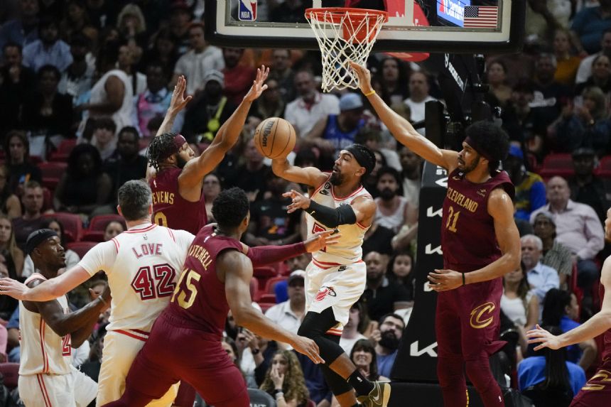 Butler scores 33, Heat rally to topple Cavaliers 119-115