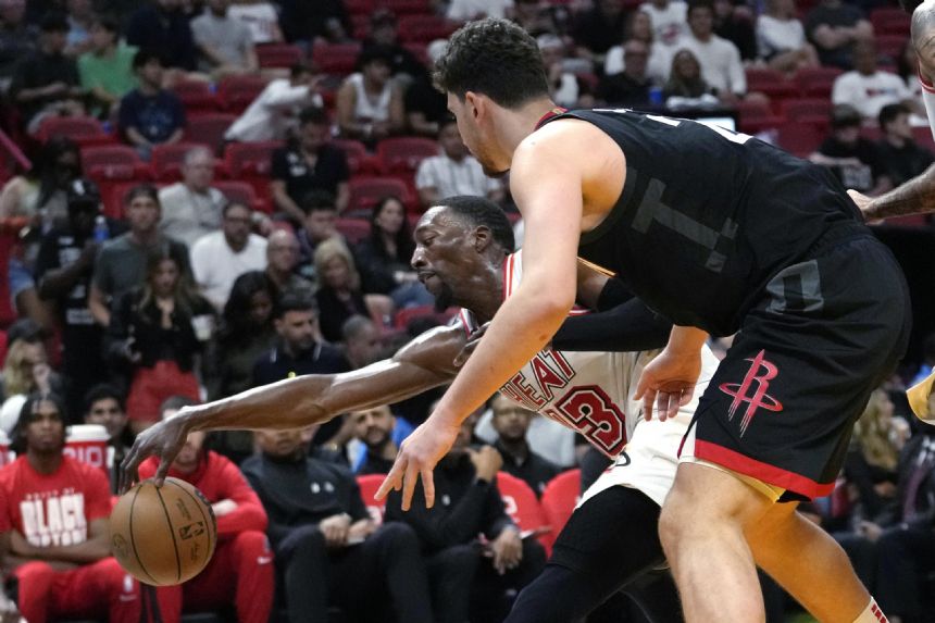 Butler's dunk at end gives Heat 97-95 win over Rockets