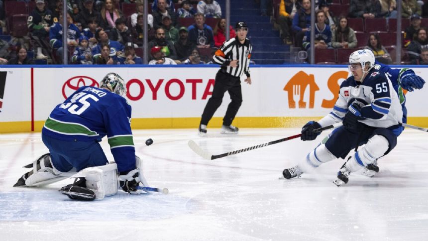 Canucks goalie Thatcher Demko leaves in 2nd period in 5-0 victory over Jets