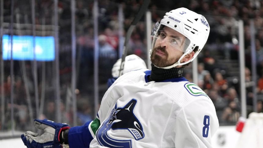 Canucks snap losing streak with 2-1 victory over Ducks