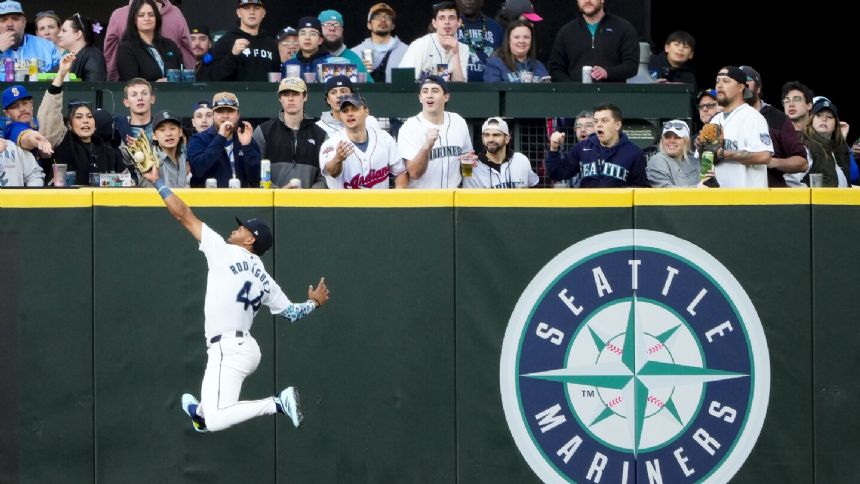 Canzone hits 3-run homer, Mariners hold on to beat Guardians 5-4