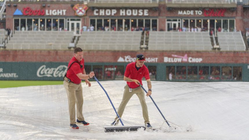 Cardinals-Braves game is postponed because of rain, doubleheader planned for Saturday