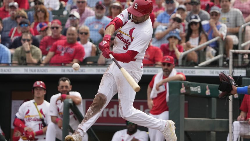 Cardinals place Dylan Carlson on injured list and will start Victor Scott at center field
