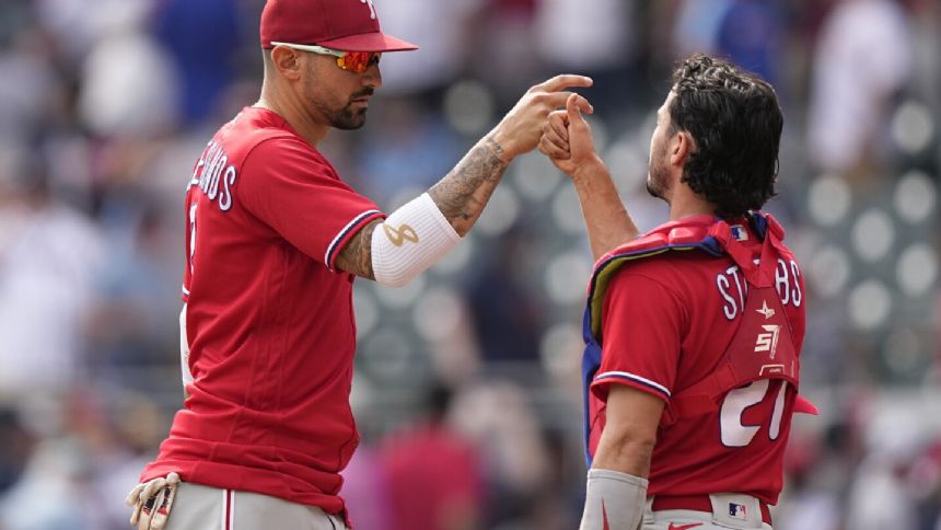 Castellanos hits 2 homers, makes pivotal throw for an out, as Phillies beat Braves 6-5 in 10