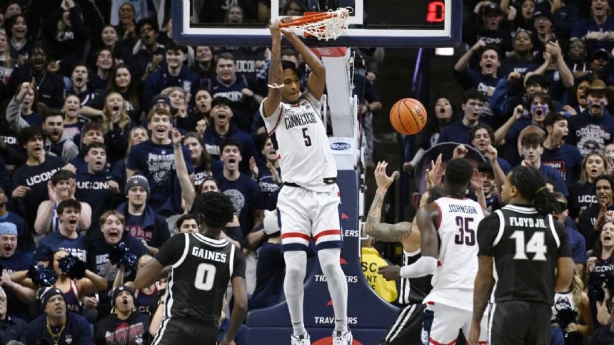 Castle scores 20 as top-ranked UConn beats Providence 74-65 in foul-filled game