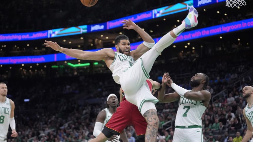 Celtics' Jayson Tatum OK after collision late in win over Heat and expects nothing less in playoffs