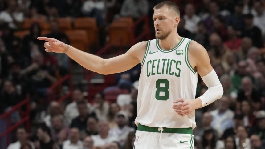 Celtics' Kristaps Porzingis sprains left ankle, leaves game against Miami