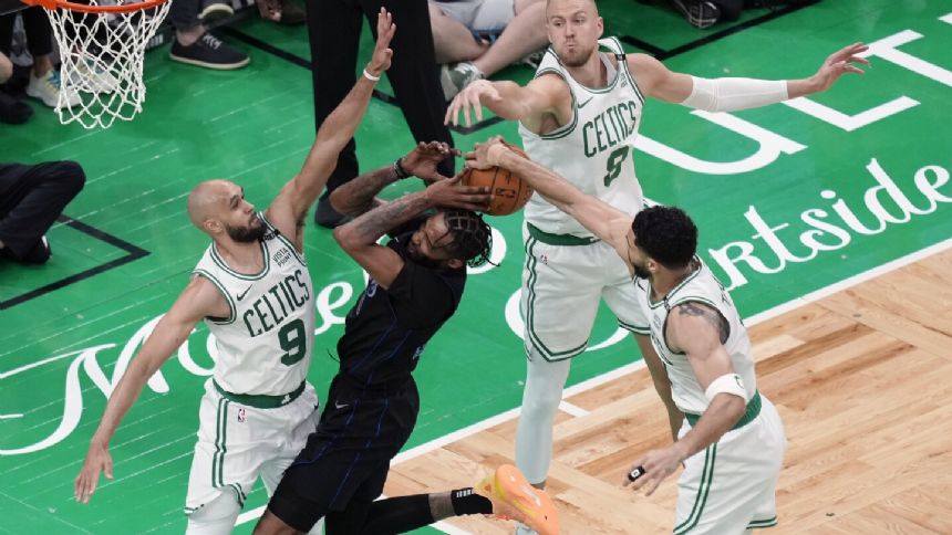 Celtics' Kristaps Porzingis suddenly a big problem in Finals for a Mavericks team that cast him off