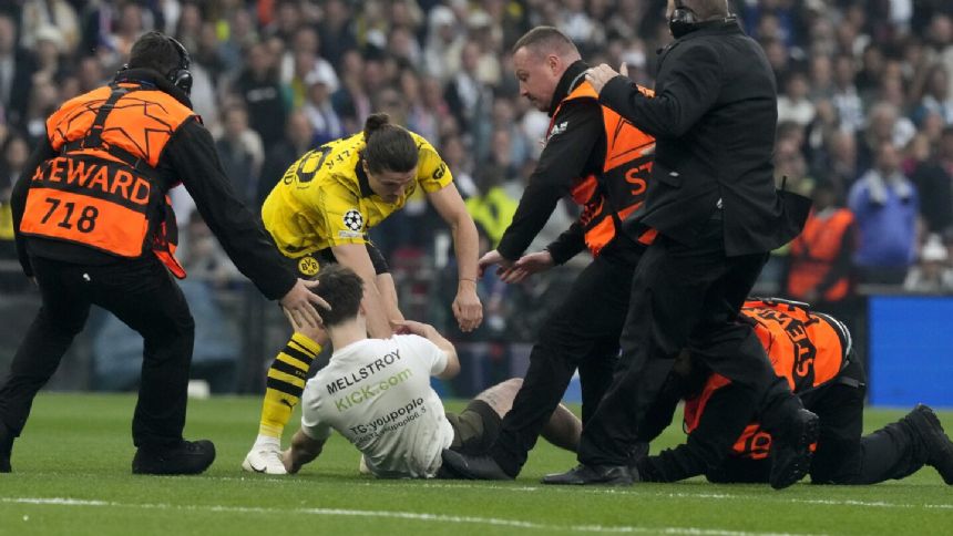 Champions League final halted inside a minute due to pitch invaders