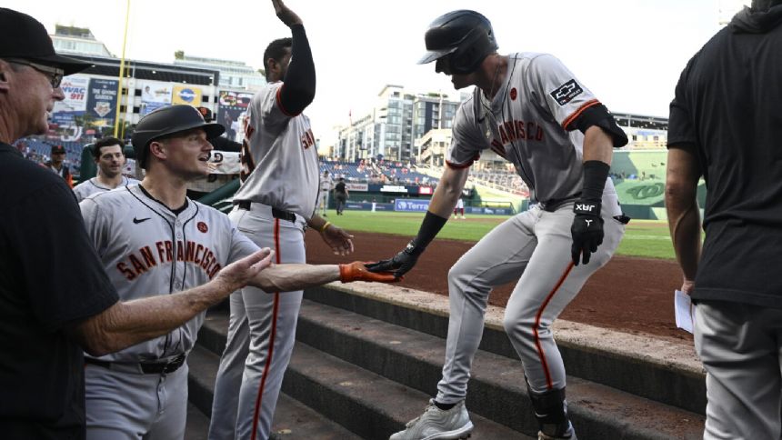 Chapman homers in his third straight game as the Giants beat the Nationals 4-1