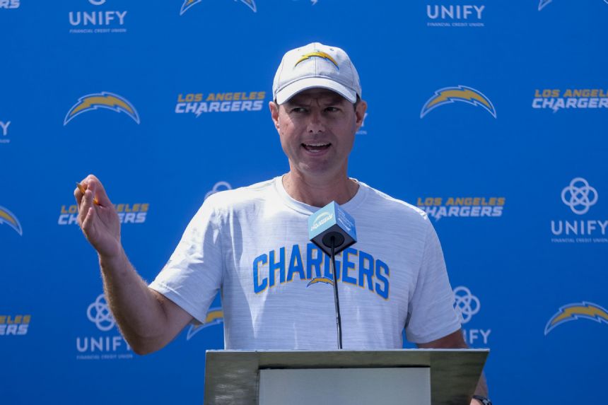 Chargers coach Staley misses practice to be with son