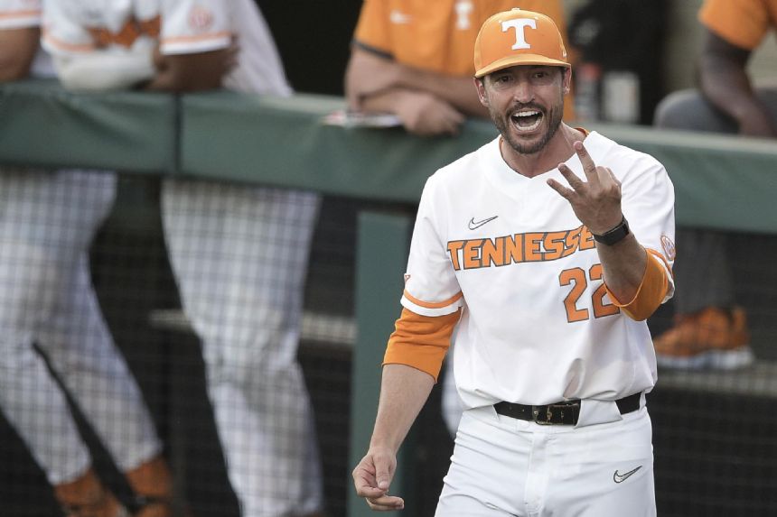 Chest bumps for charity Vols coach makes best of suspension