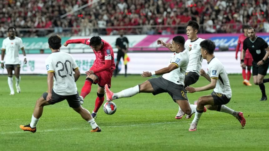 China keeps its World Cup dream alive despite 1-0 loss to South Korea. Thailand and India out