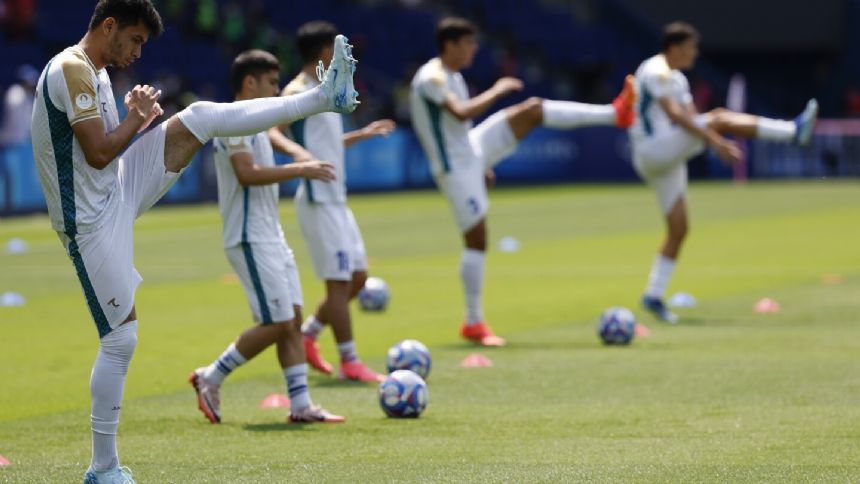 Competition at the Paris Olympics begins with soccer matches involving Spain and Argentina